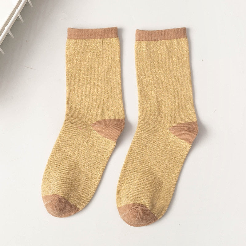 Myke og behagelige glittersokker, unisex, med et touch av glam til garderoben.