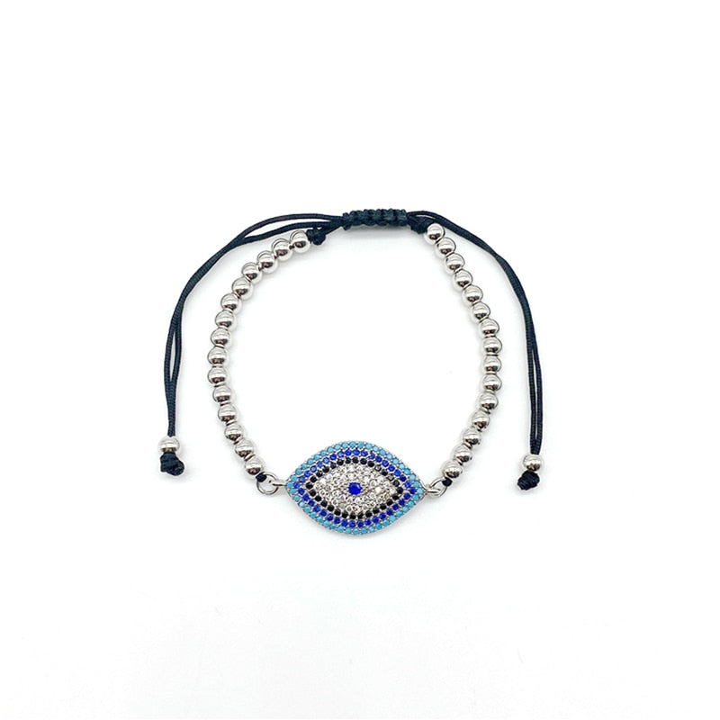 Gullbelagt onde øye armbånd for dame med kubisk zirkonia. Vakkert smykke for beskyttelse og stil.
