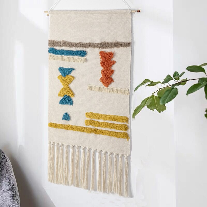 Detaljert håndvevd billedvev med tekstur og frynser. For en autentisk bohemsk stil i stue og soverom.