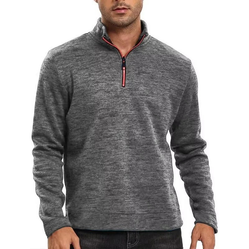 Enkel og elegant herre genser med halv glidelås. Perfekt overdel for en stilren look.