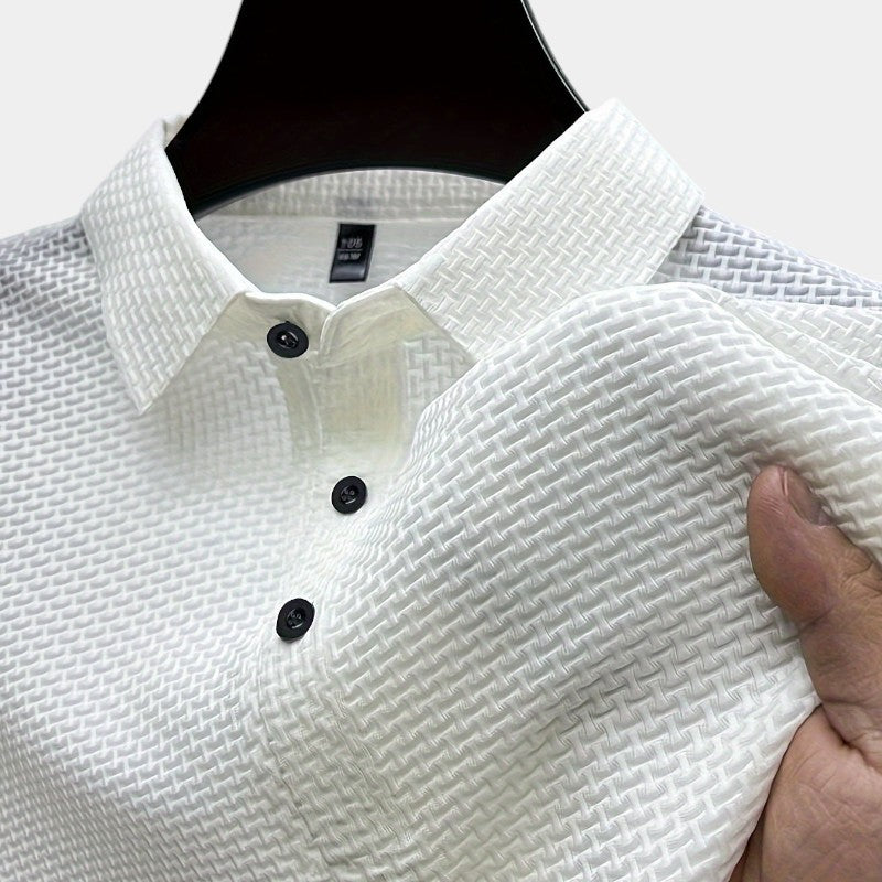 Herre kortermet golfskjorte i nylon/spandex. Pustende, stilren med geometrisk mønster og reverskrage.