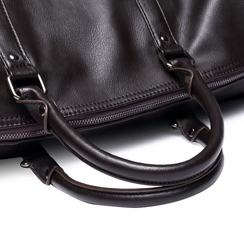 Svart herre skinn duffelbag, håndbagasjestørrelse, stilig reisebagasje