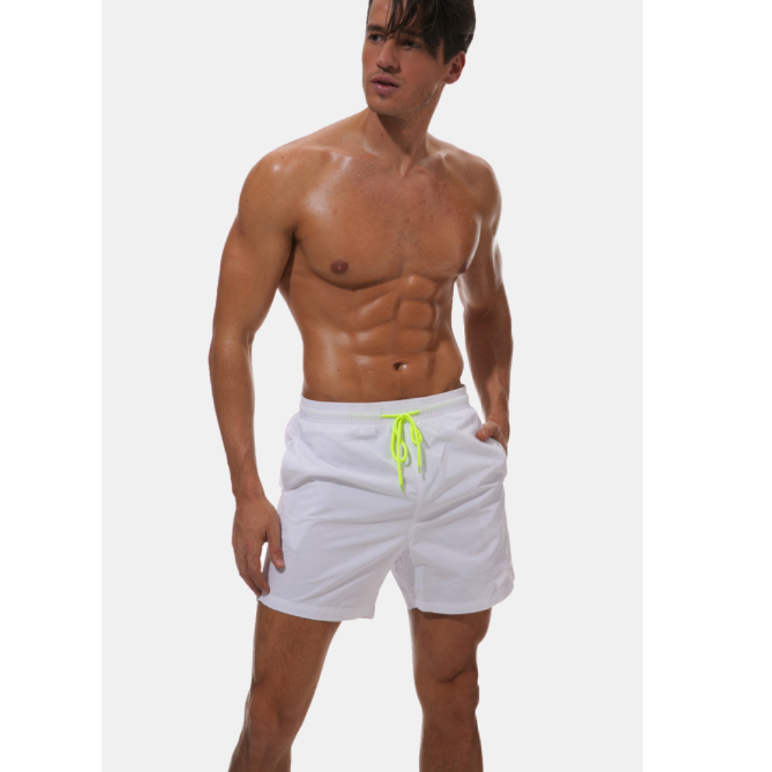 Herre svømmeshorts med hurtigtørkende egenskaper. Perfekt for dykking, bading og strandaktiviteter.