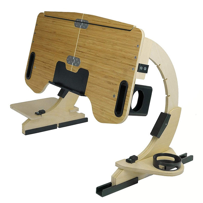 Ergonomisk justerbart tre laptopbord i eik. Optimal for produktivitet og komfortabel bruk på hjemmekontoret.