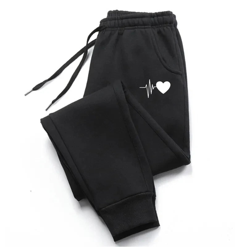 Komfortabel dame-joggebukse i mykt stoff, perfekt for trening og avslappet fritid.