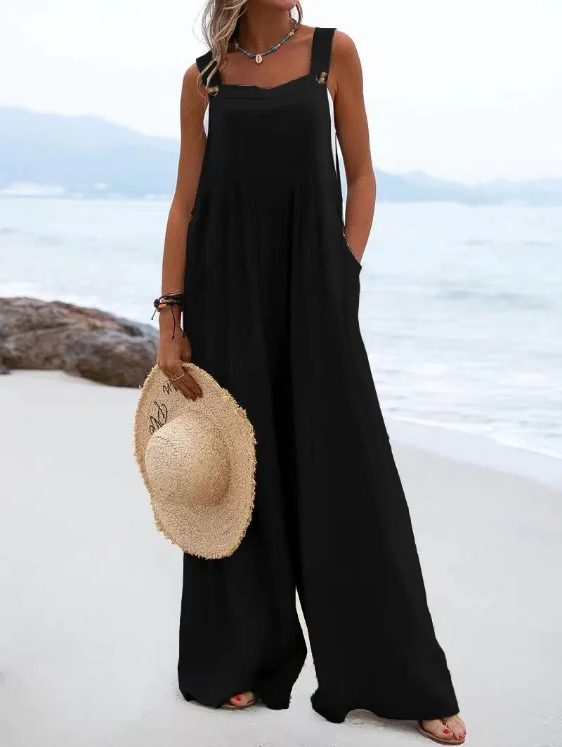 Dame jumpsuit med justerbare bukseseler, løs passform og vide ben, ideell for sommeren.