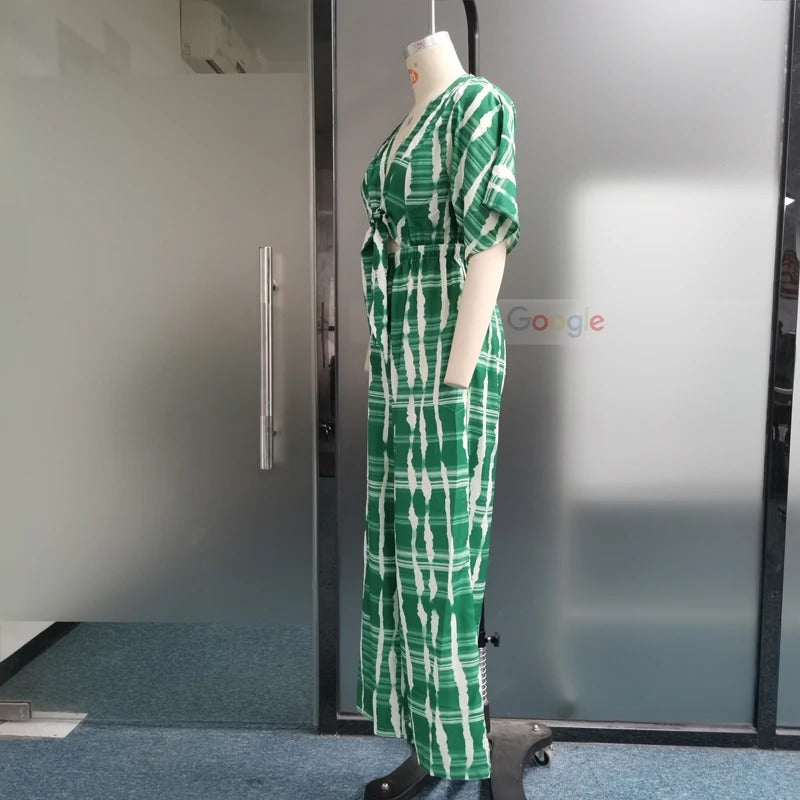Myk og komfortabel jumpsuit for kvinner med dolman-ermer og v-hals, perfekt for relaxed sommerbruk.