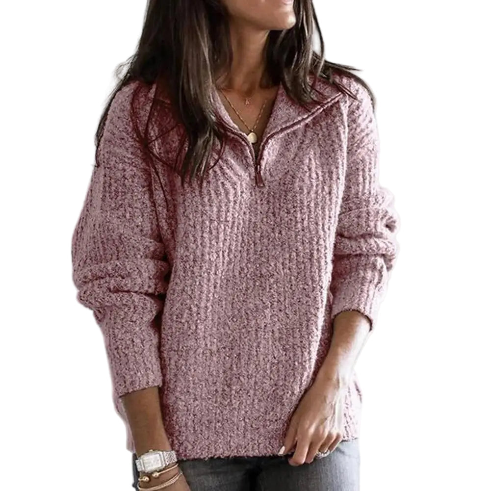 Komfortabel halv-glidelås pullover damegenser med løs passform. Perfekt for høst og vinter.