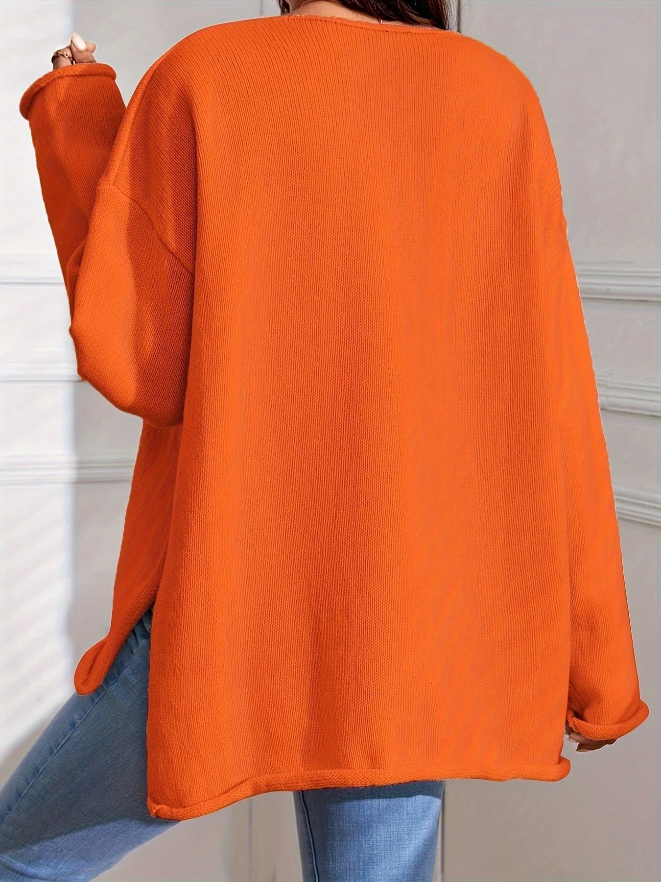 Trendy overdimensjonert V-hals genser for kvinner, med langermet design og løs passform, ideell for casual stil.