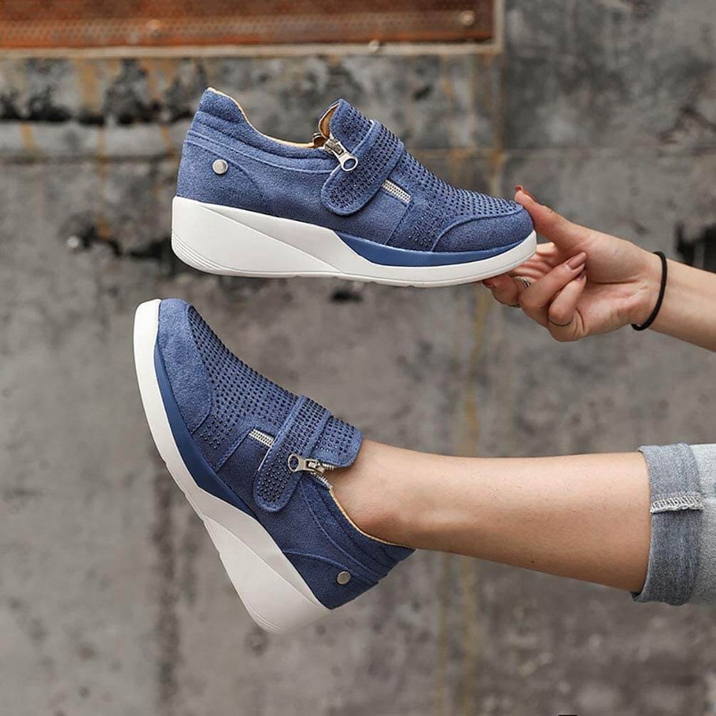 Moderne damesneakers i pustende stoff med funksjonell glidelås, perfekt for fritid.