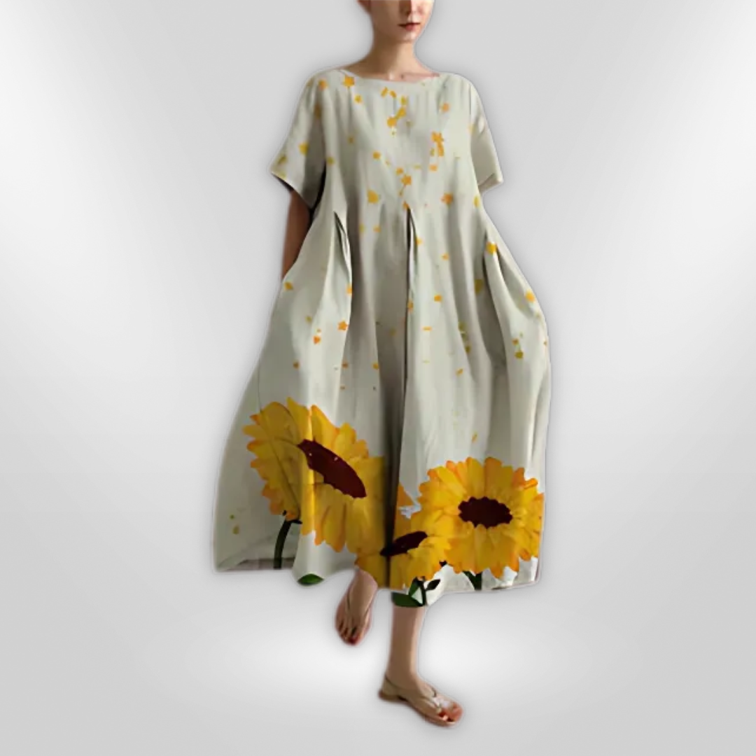 Sommerlig kvinne maxikjole med vakkert blomstermønster, komfortabel og elegant design.
