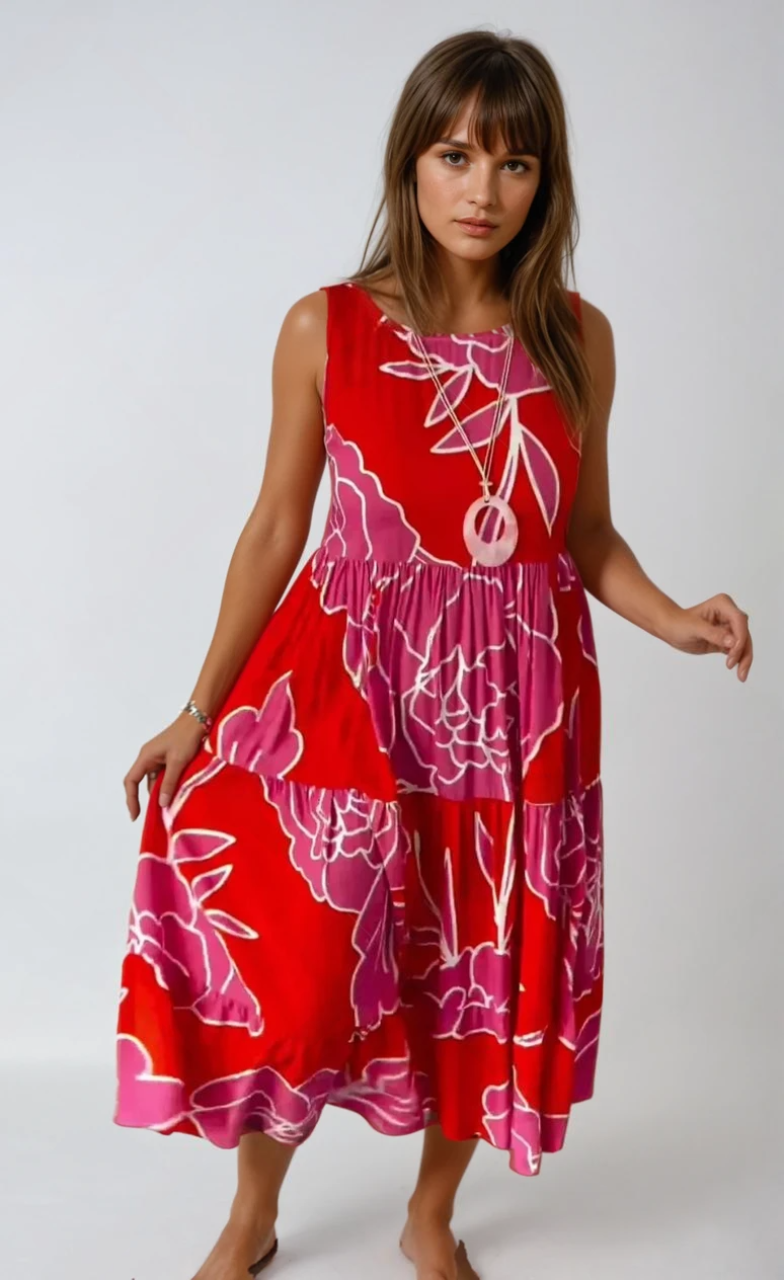 Kvinners lette sommerkjole med elegant blomstertrykk. Myk og komfortabel stil som passer til alle.