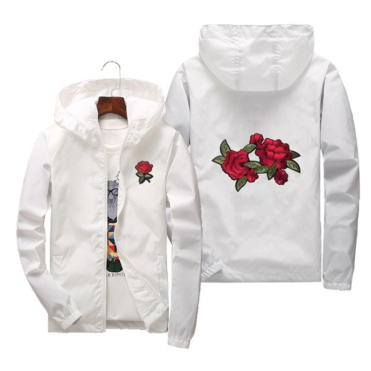 Fargerik roseprint vindjakke for damer, lett og vanntett. Ideell for fritid og sport.