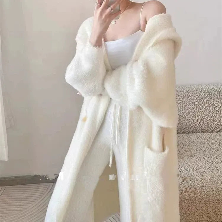 Komfortabel oversized hettekardigan for kvinner, perfekt for fritid og hverdagsstil. Myk damecardigan for kaldere dager.