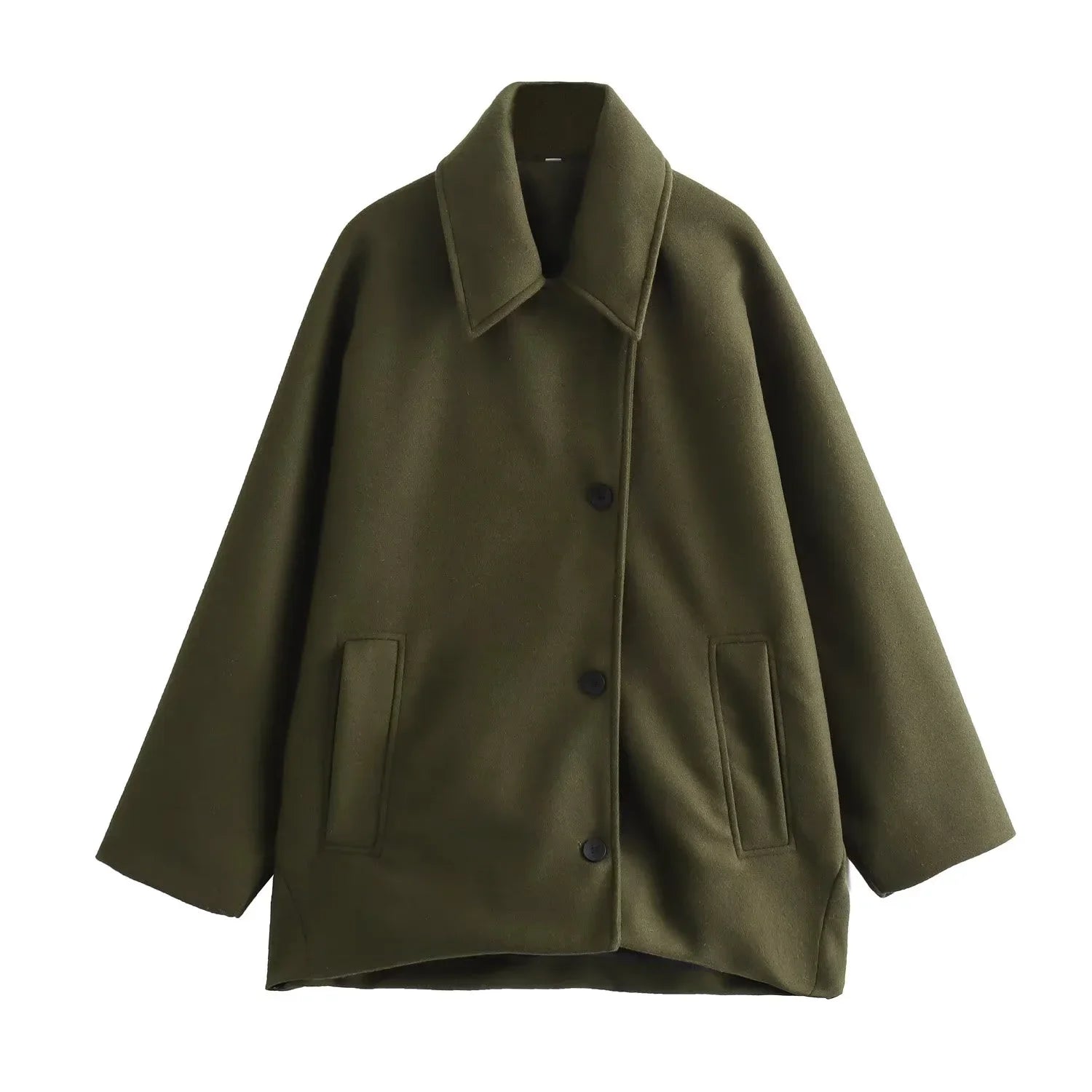 Kvinne oversized vinterfrakk i varmt stoff med lange ermer og stilige knapper, perfekt for vintermote.