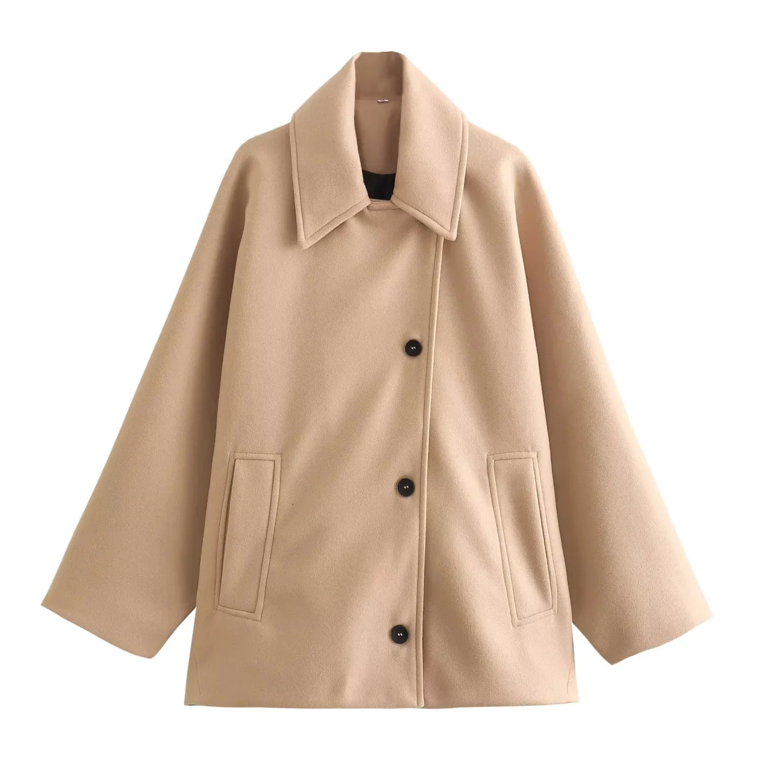 Trendy oversized vinterfrakk til dame med lange ermer og knapper. Ideell som komfortabel og varm hverdagfrakk.