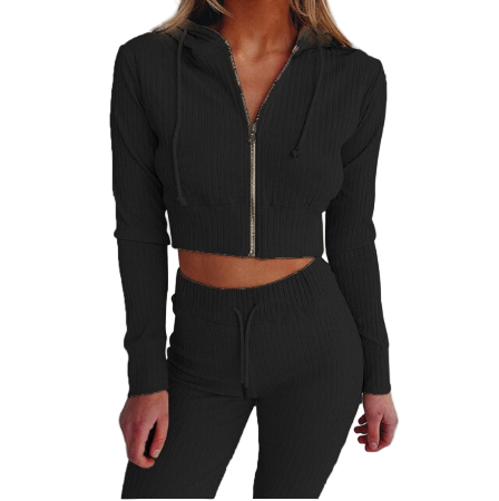 Kvinne sporty tracksuit, komfortabelt sett for trening og hverdagsbruk.