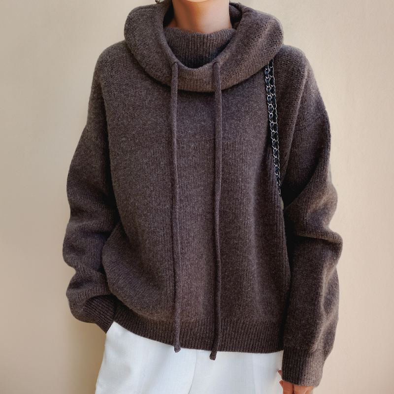 Motebevisst dame hettegenser med tidløs design, perfekt for en casual og stilig look.