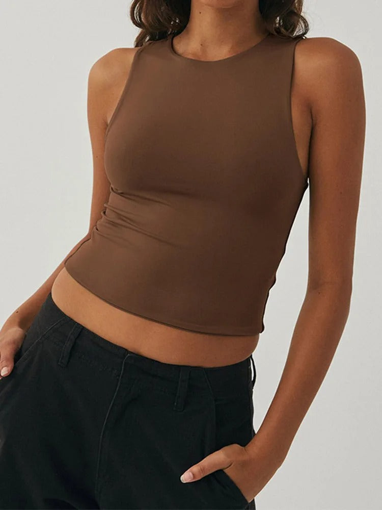 Komfortabel slim fit yogavest for kvinner, ermeløs, for fleksible bevegelser og komfort.