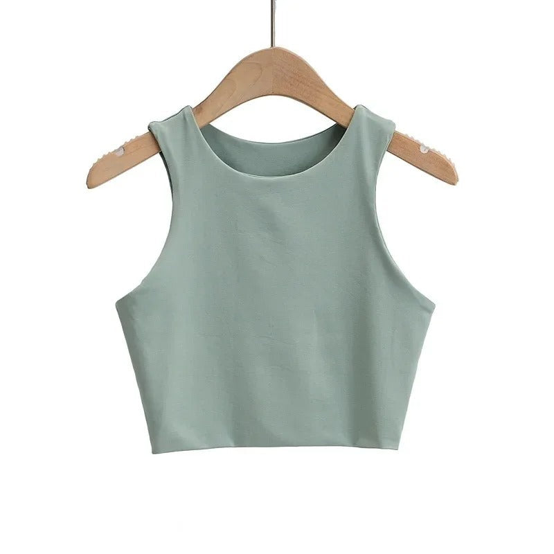 Allsidig kvinner tanktopp, slim fit design med rund o-hals, ideell for lagvis bruk og mote.