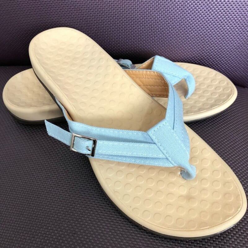 Kvinner sandaler med fotbuestøtte, designet for optimal komfort og holdning.