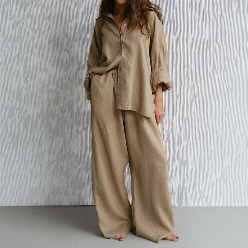 Elegant todelt sett med oversized skjorte og løse vide bukser for kvinner. Ideell for vår- og sommermote.