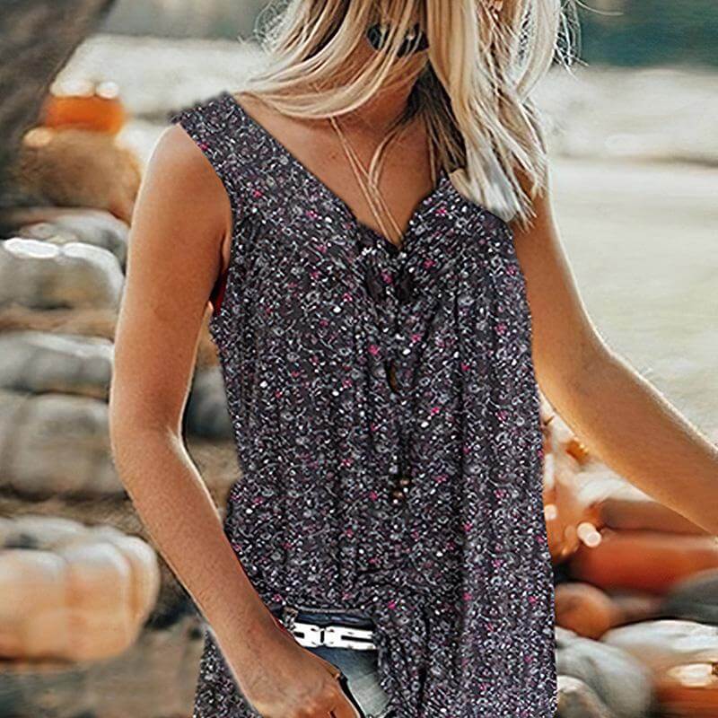 Elegant V-hals bluse for kvinner, med blomstret mønster. Ideell for en stilig og frisk sommerlook.