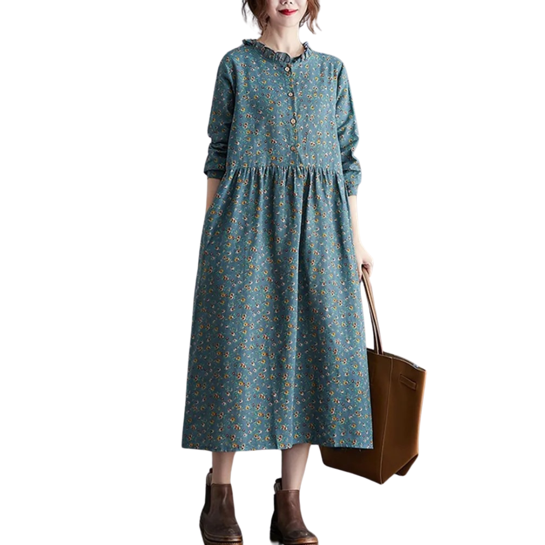 Kvinner vintage blomstret kjole med elegante volanger. Langermet, komfortabel og retro stil for dame.