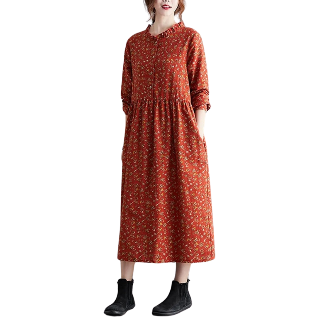 Stilig vintage kjole for kvinner med flotte volanger og blomstermønster. Langermet og komfortabel damekjole.