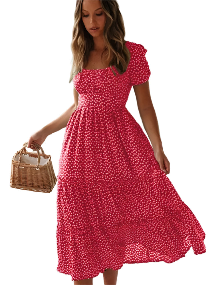 Elegant, blomstret maxikjole for kvinner. Med feminine puffermer og en trendy firkantet hals. Vintage-inspirert.
