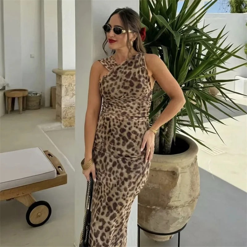 Svart gjennomsiktig off-shoulder topp for kvinner. Elegant og allsidig festtopp.
