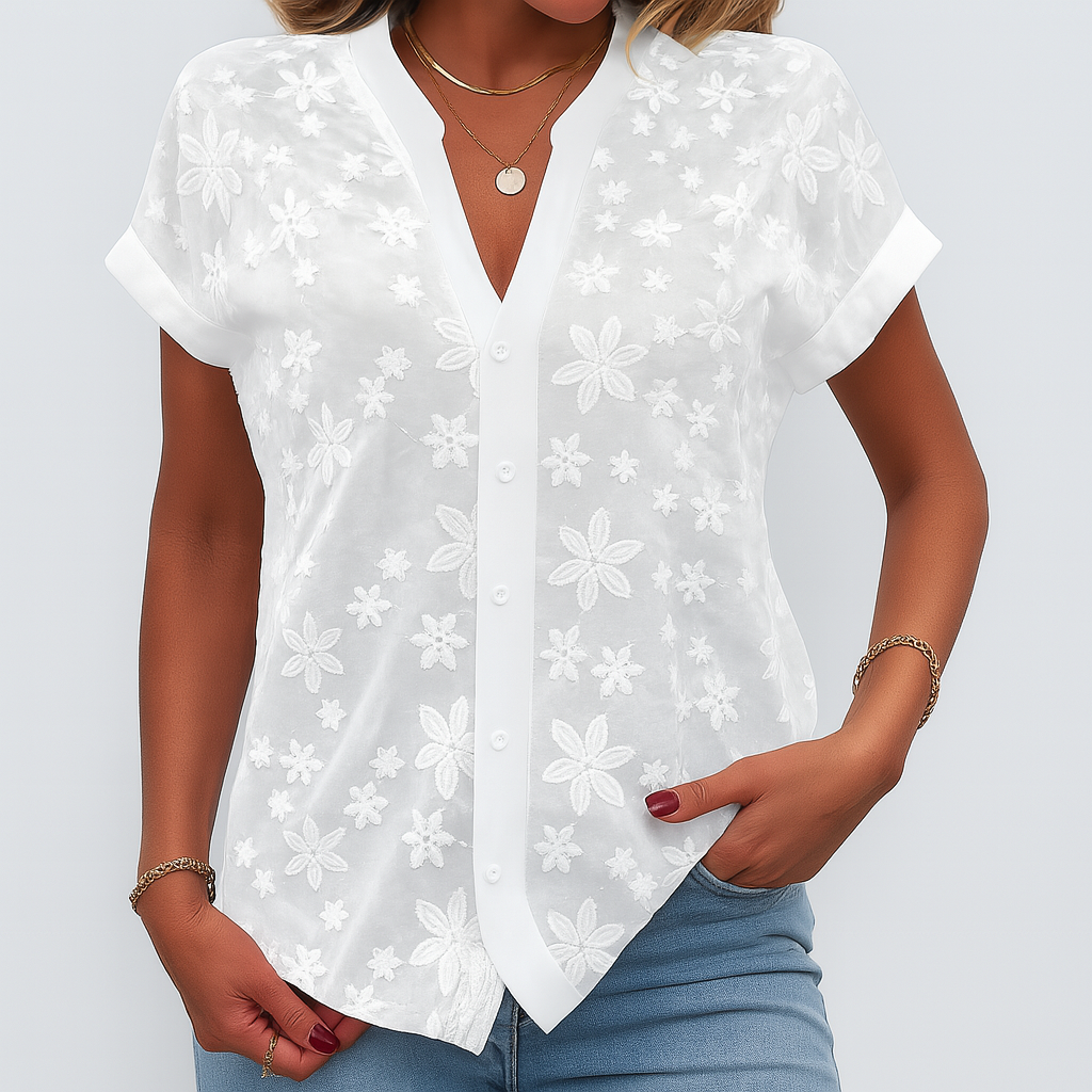 Kvinners kortermet blomstret bluse med V-hals. Elegant og feminin sommerbluse for hverdag og vårklær.