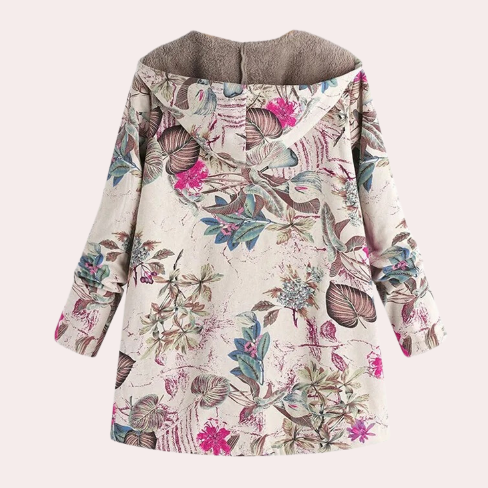 Stilfull rosa dame vinterjakke med varm hette, ideell for utendørsaktiviteter og fritid.