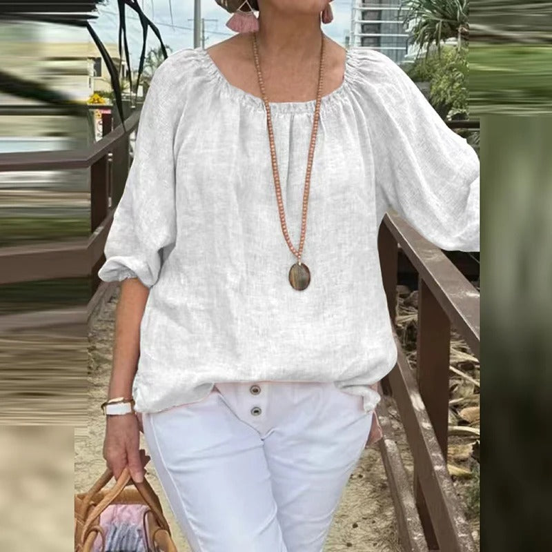 Myk halvermet bluse for damer, uformell stil, perfekt for varme dager.