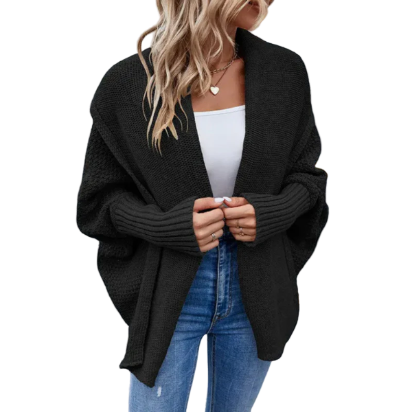 Lang, oversized damecardigan med åpen front i mykt stoff, perfekt for lag-på-lag og hverdagsbruk.