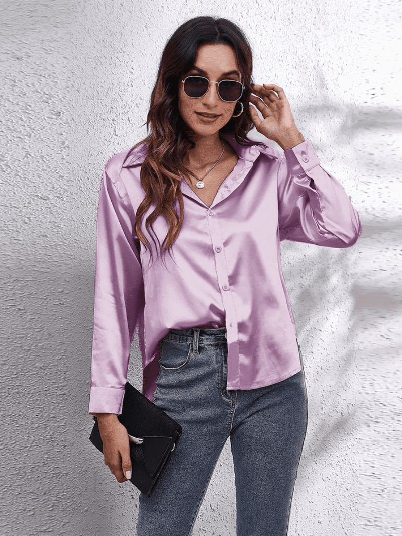 Feminin og elegant langermet kvinnebluse som fremhever din stil.
