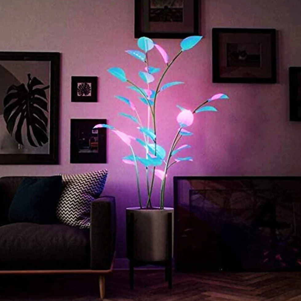 Moderne grå LED-lampe i planteform. Skaper stemning med dynamisk fargeveksling.