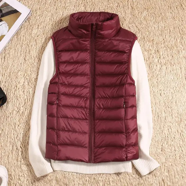 Premium lettvekts dunjakke vest for damer, gir varme og eleganse som yttertøy for vår og høst.