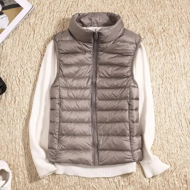 Stilfull lett dunjakke vest for damer, ideell vår- og høstklær som gir komfort og eleganse.