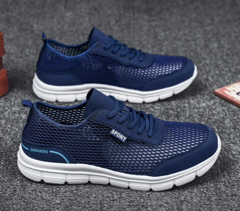Detalj av komfortabel såle på lette mesh joggesko for menn, ideell for hverdagsbruk.