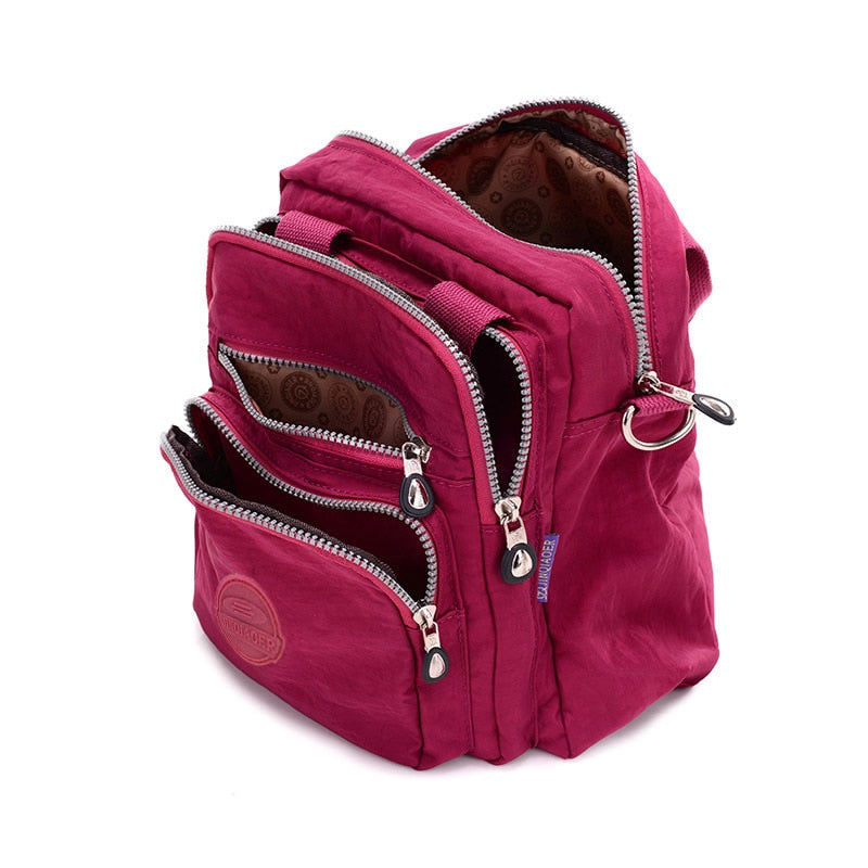 Praktisk nylon crossbody for damer, multifunksjonell og enkel å holde ryddig.