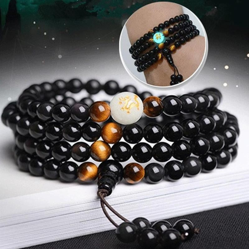 Unisex armbånd med glødende drage og sort obsidian for beskyttelse og stil.