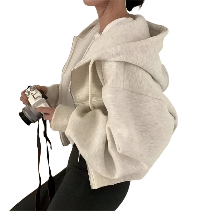 Komfortabel hettegenser for kvinner i oversized crop modell, ideell for en stilfull hverdag.