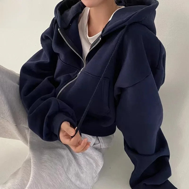 Avslappet oversized crop hettegenser for kvinner, gir optimal komfort og en trendy silhuett.