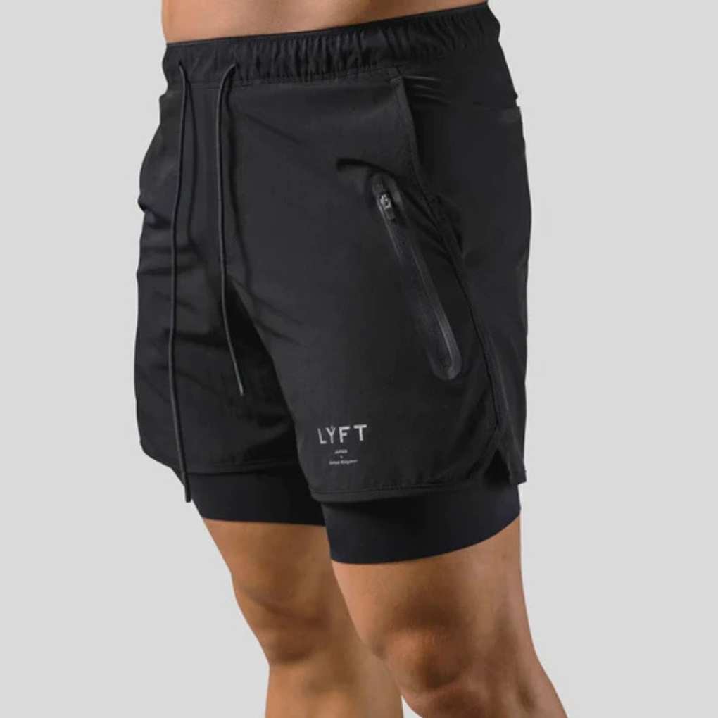Menns 2-i-1 løpeshorts med kompresjonsinnlegg, ideell for løping og trening.