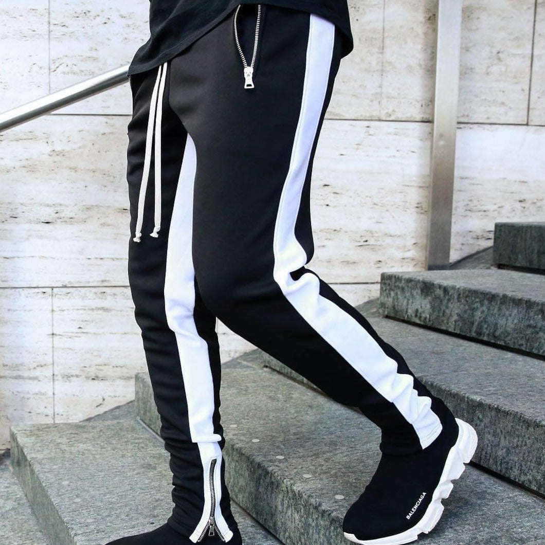 Menns allsidige joggebukser i myk bomull for stil og komfort. Perfekt for urban fritid.