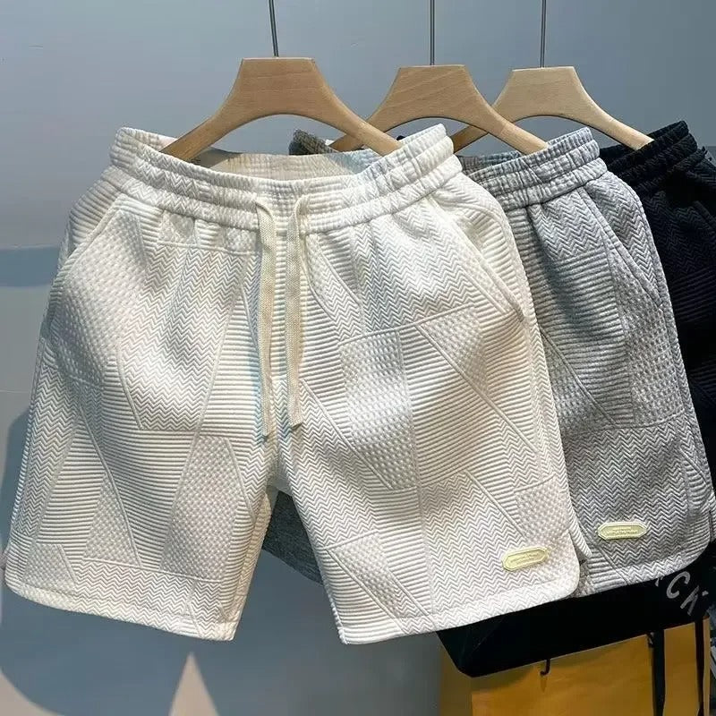 Stilige og avslappede menns gymshorts, perfekt for trening, fritid eller en komfortabel sommerdag.