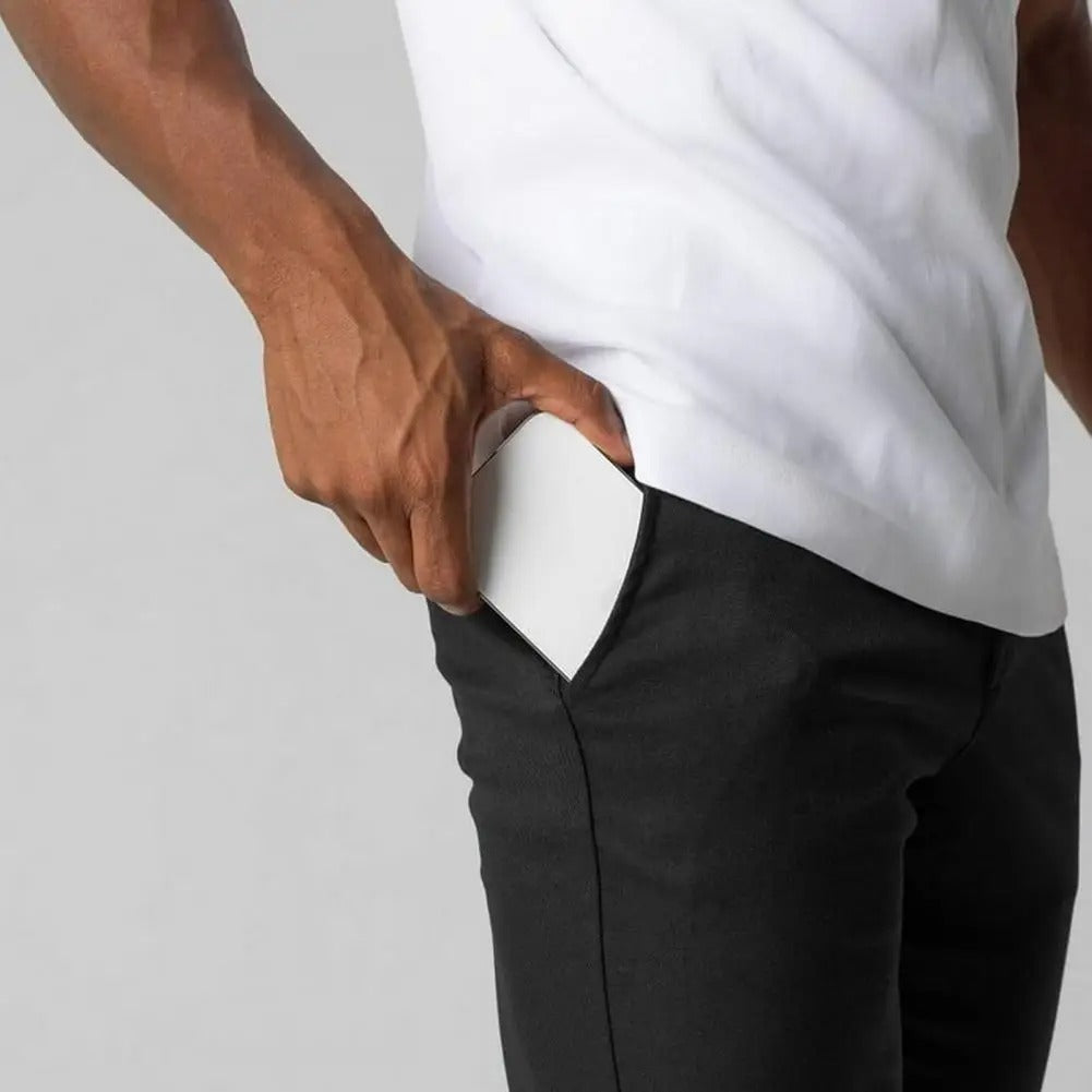 Komfortabel businessbukse for menn. Slank passform slim fit bukse med fleksibel strekklinning for bevegelsesfrihet på jobb.