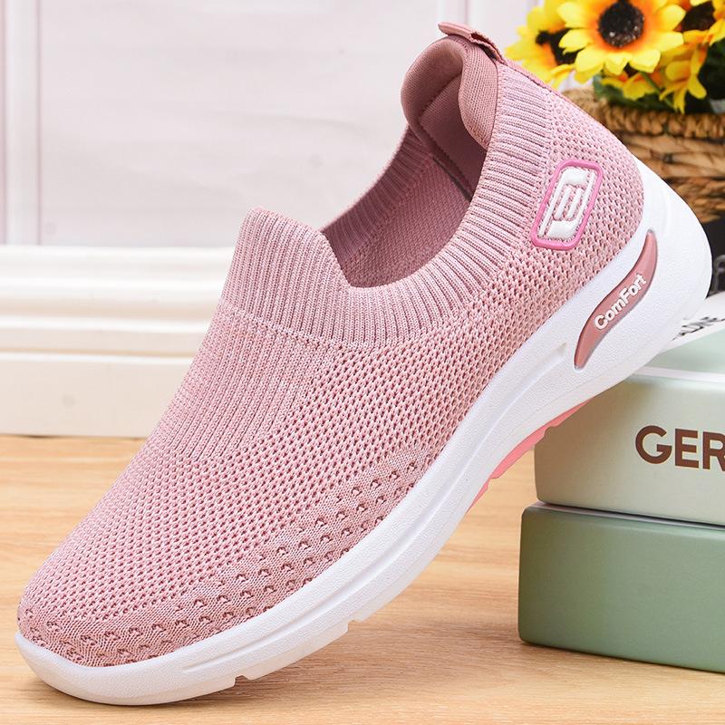 Bakside av svart herre slip-on joggesko, viser enkel inngang og komfortabel passform.