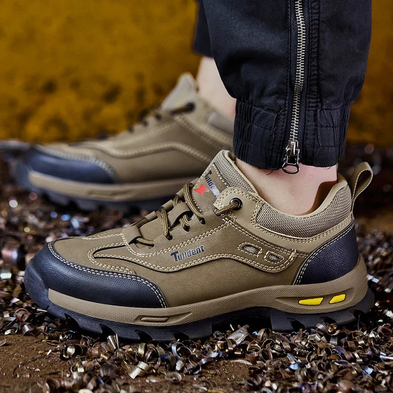Punkteringssikre sikkerhetssko for menn, robuste taktiske arbeidssko med forsterket tå. Trygge for ethvert arbeidsmiljø.